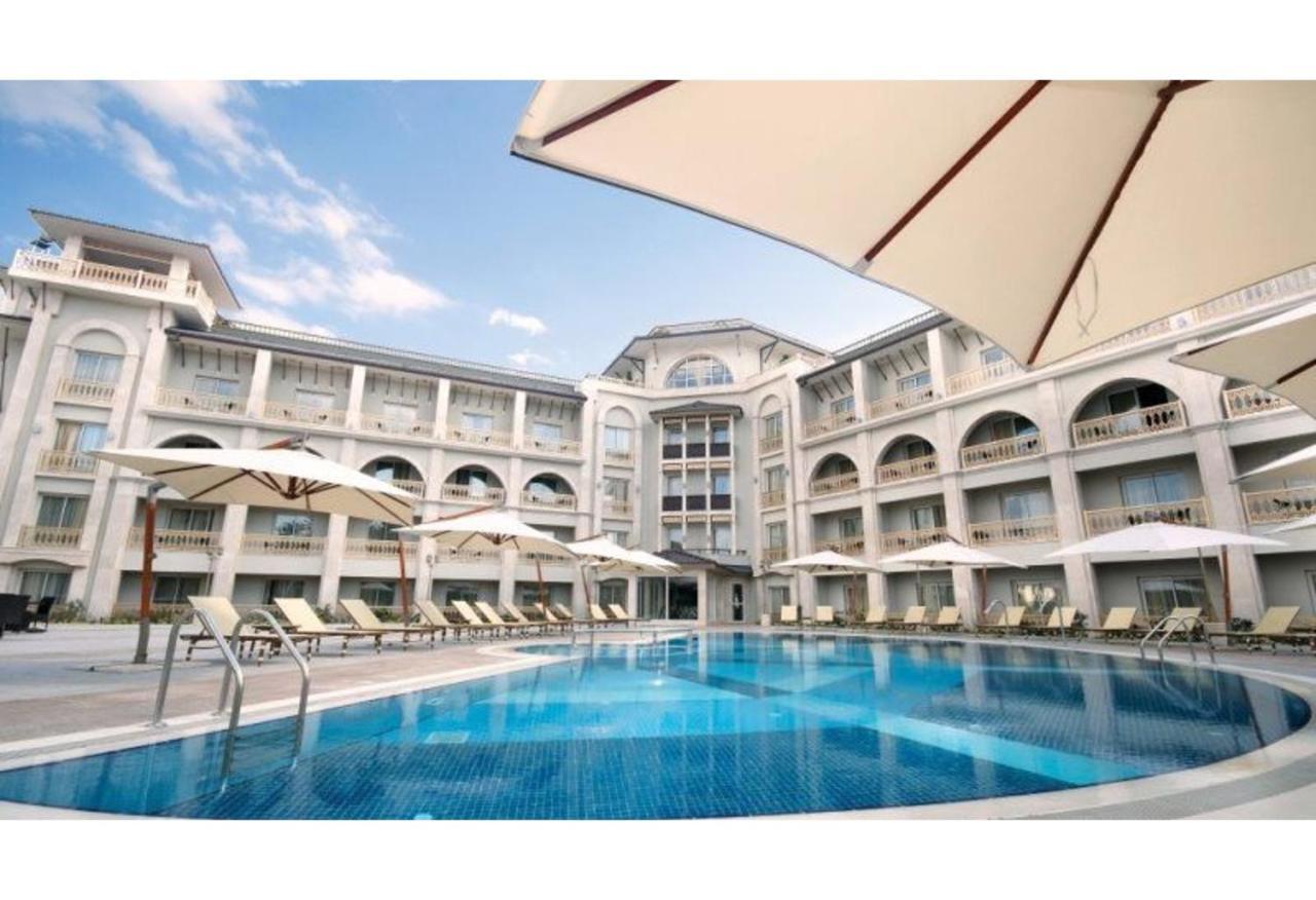Savoy Hotel Spa & Casino Kerínia Kültér fotó The swimming pool at the hotel